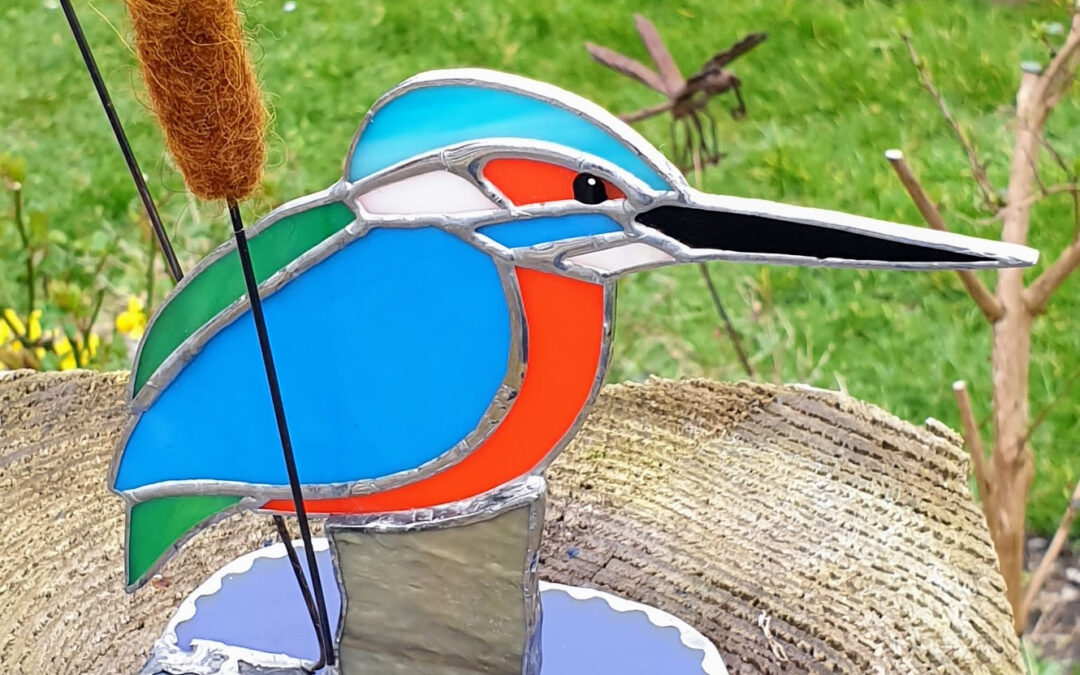 Kingfisher with bull rushes
